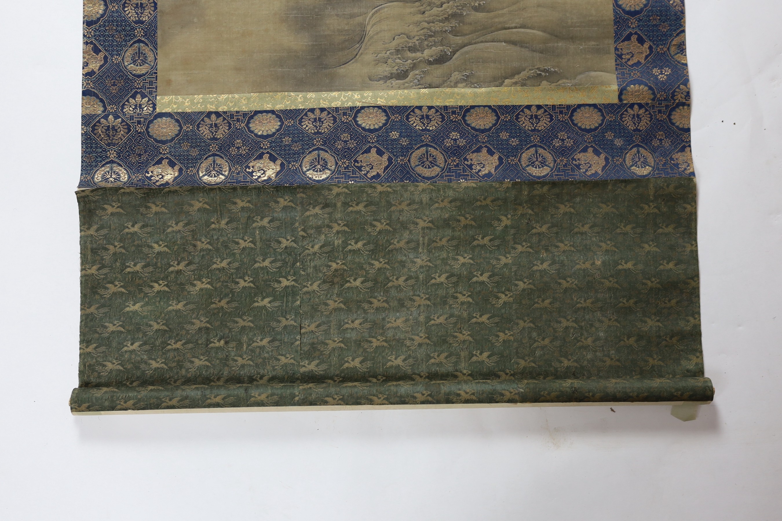 Japanese School, late Edo period, scroll painting of waves and the moon behind rocks, image 28.5cm x 46.5cm